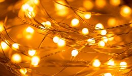 yellow-led-garland-on-a-wire-closeup-christmas-lighting-for-your-picture-id1290766525
